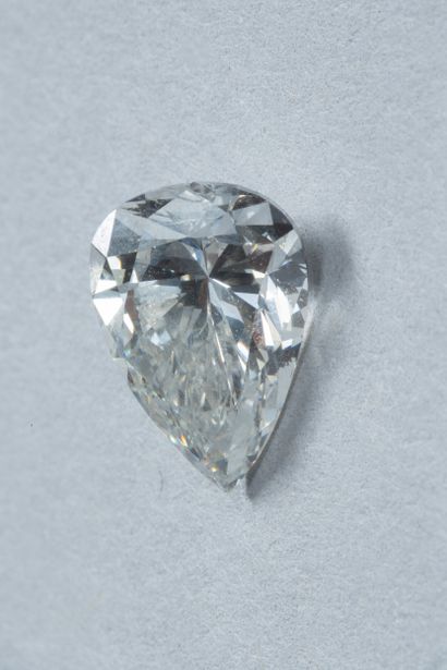 Pear-cut diamond on paper weighing 2.57 carats....