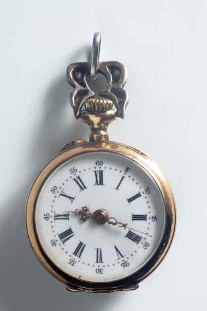 Petite montre et contre boîtier en or jaune...