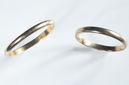 Two wedding rings in yellow gold (750 thousandths)...