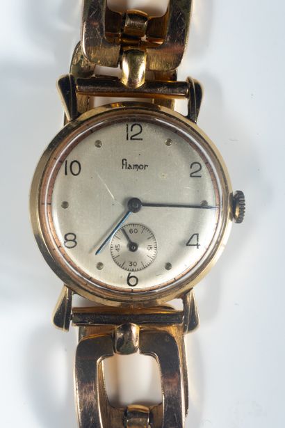 FLAMOR. Montre boîtier rond en or jaune (750...