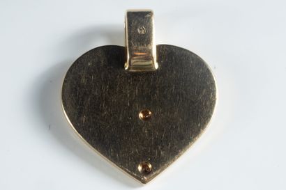 Pendentif « coeur » en or jaune (750 millièmes)...