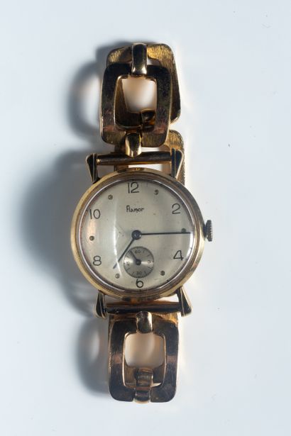 FLAMOR. Montre boîtier rond en or jaune (750...
