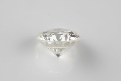 Brilliant-cut diamond on paper weighing 1.96...