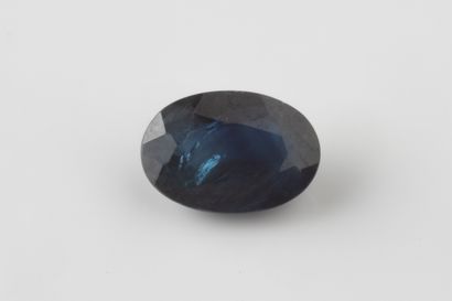 Oval faceted sapphire on paper weighing approx....