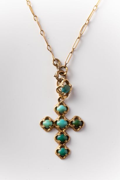 Turquoise cabochon cross with yellow gold...