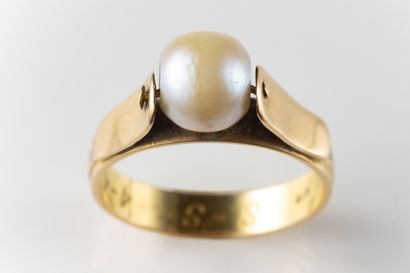 Ring centered with a mobile white cultured...