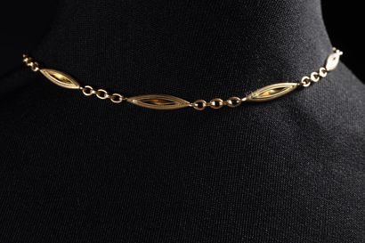 Yellow gold (750 thousandths) vest chain...