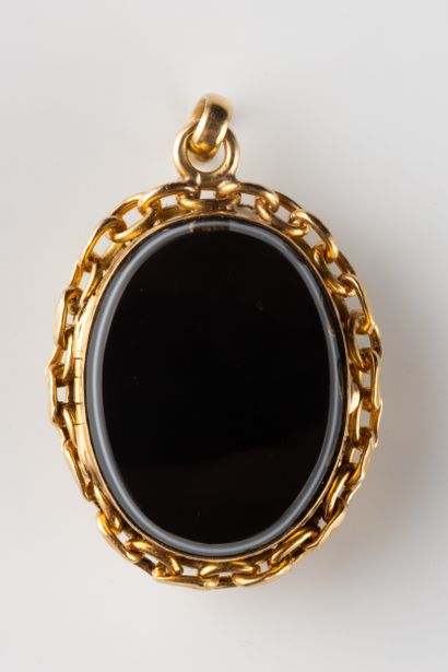 Opening pendant adorned on each side with...