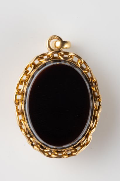 Opening pendant adorned on each side with...