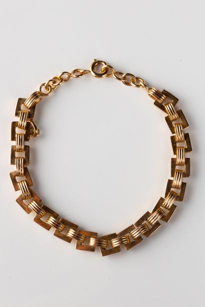 Square links alternating with gadroons bracelet...