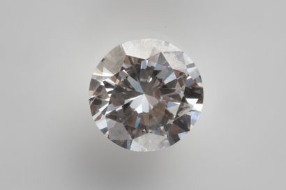 Brilliant-cut diamond on paper weighing 2.02...