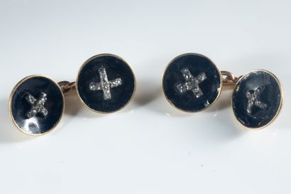 Pair of round concave cufflinks set in yellow...