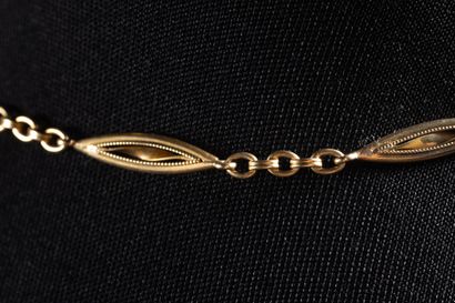 Yellow gold (750 thousandths) vest chain...