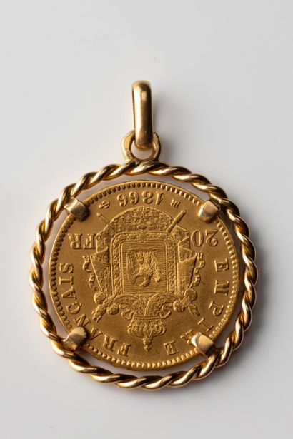 20-franc gold coin pendant set in a cord...