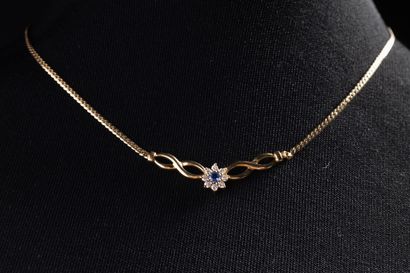 Yellow gold (750 thousandths) necklace centered...