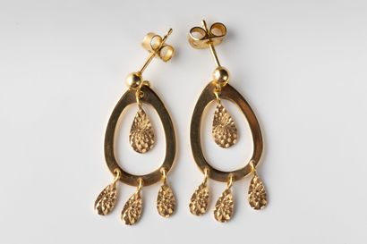 Pair of drop earrings and pendants in yellow...