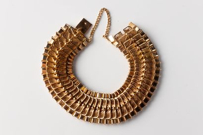 Supple bracelet decorated with rectangular...