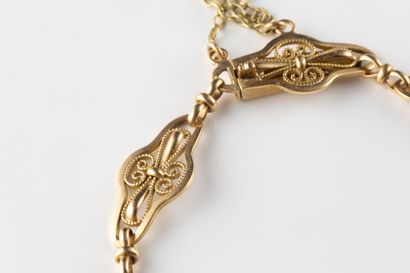 Filigreed and curved link bracelet in yellow...