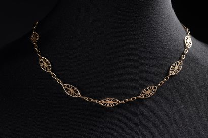 Yellow gold (750 thousandths) filigree ogival...