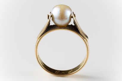 Ring centered with a mobile white cultured...