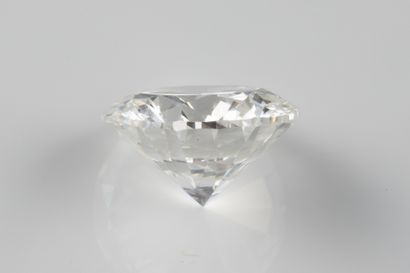 Brilliant-cut diamond on paper weighing 2.02...