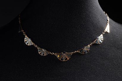 Drapery necklace centered with 5 fan-shaped...