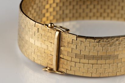Ribbon bracelet adorned with briquettes on...