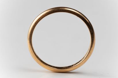 A wedding band in yellow gold (750 thousandths)....