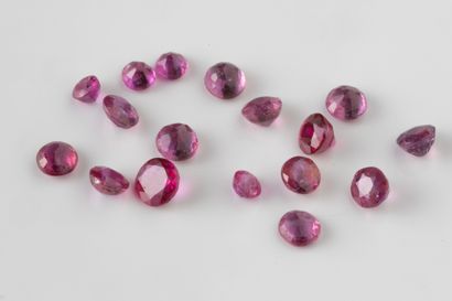 Lot of round faceted rubies weighing approximately...