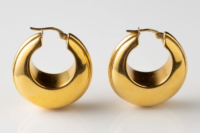 Large pair of creole earrings in yellow gold...