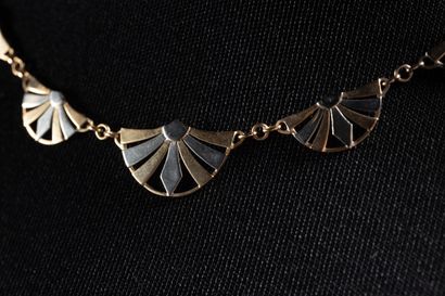 Drapery necklace centered with 5 fan-shaped...