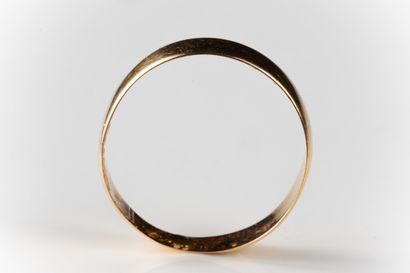 * Wedding band in yellow gold (750 thousandths)....