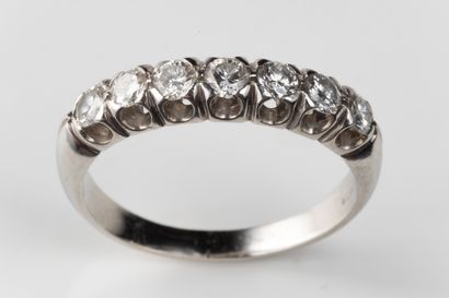 Half wedding band in white gold (750 thousandths)...