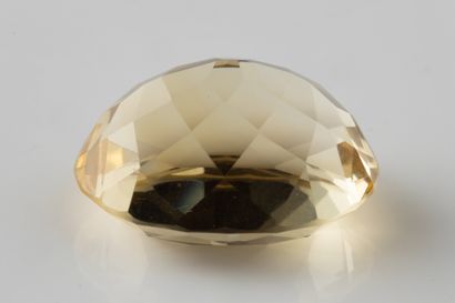Oval citrine on paper weighing 27.80 carats,...