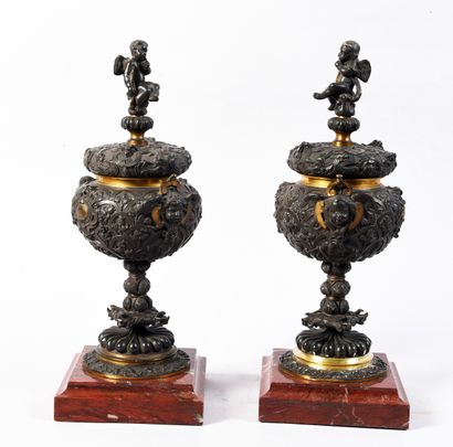 Pair of covered urns in the Barbedienne style...