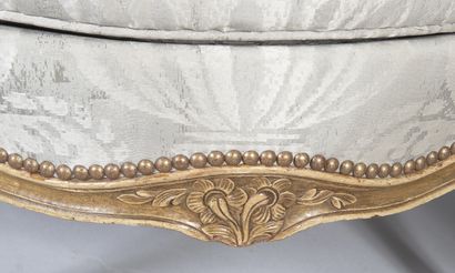 Pair of small bergères in molded and carved...