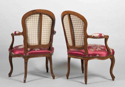 Two cabriolet-back armchairs in molded wood,...
