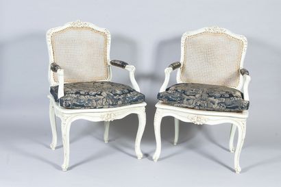 Pair of molded, carved and white rechampi...