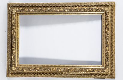 Large Louis XIII style frame in carved, stuccoed...