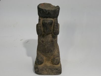 Stone sculpture with crusty patina depicting...