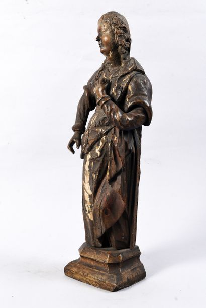 Carved walnut Virgin or Saint 
Probably French,...