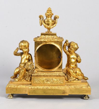 Gilt bronze clock in the Louis XVI style,...