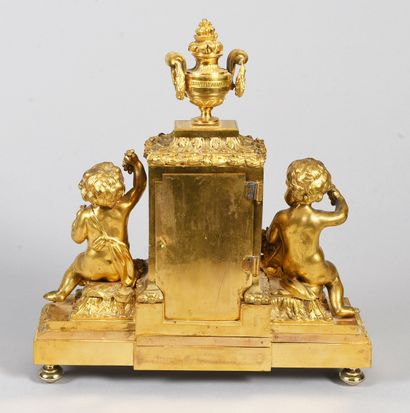 Gilt bronze clock in the Louis XVI style,...