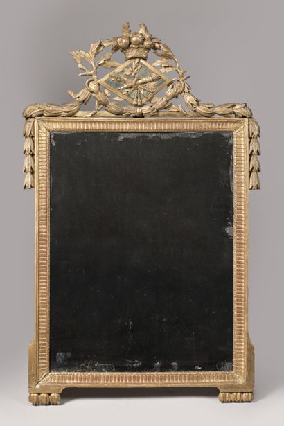 Molded, carved and gilded wood pediment sconce...