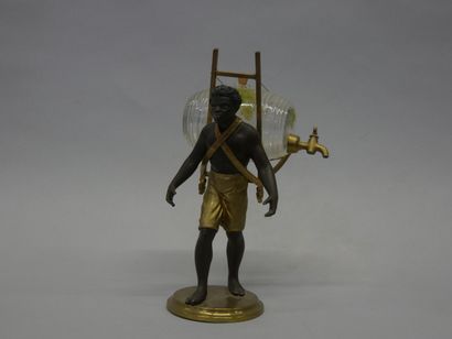 Portefaix en bronze à patine brune et dorée...