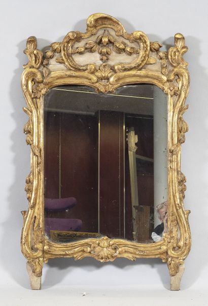 Carved and gilded wood pediment mirror with...