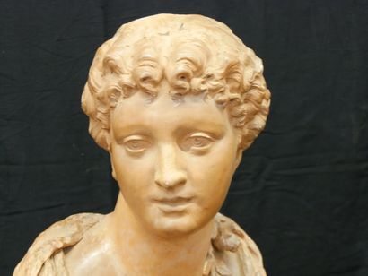 * Bust of a woman with a flowery bun on a...