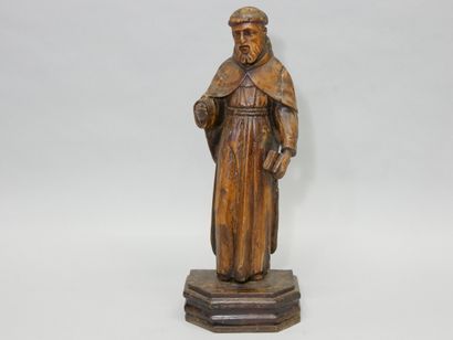 Saint préchant 
En bois sculpté et verni...