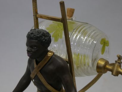 Portefaix en bronze à patine brune et dorée...