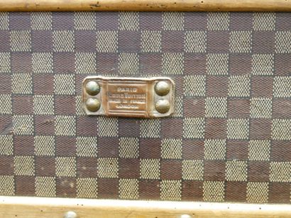 Louis VUITTON 
- Tall checkered canvas trunk...